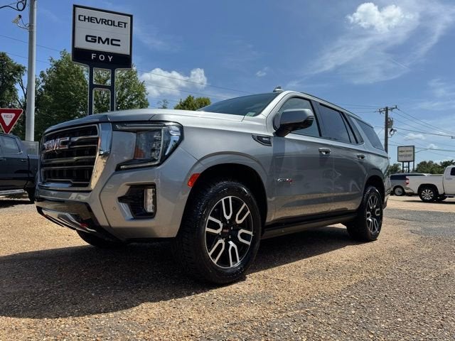 2023 GMC Yukon AT4 in Sterling Metallic — front three-quarter view