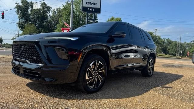 2026 Buick Enclave Sport Touring in Ebony Twilight Metallic — front three-quarter view